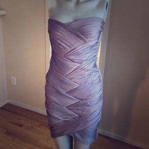 Mini dress, stretchy, strapless, gorgeous effect.